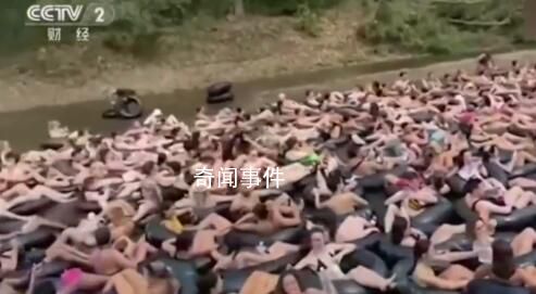 大批游客擠爆泰國(guó)一漂流景點(diǎn) 堵人場(chǎng)面恐怖