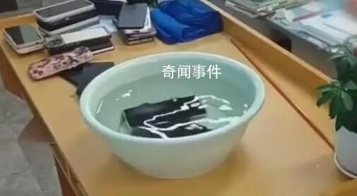 貴陽一學(xué)校20余學(xué)生手機(jī)被泡水處置 引發(fā)熱議